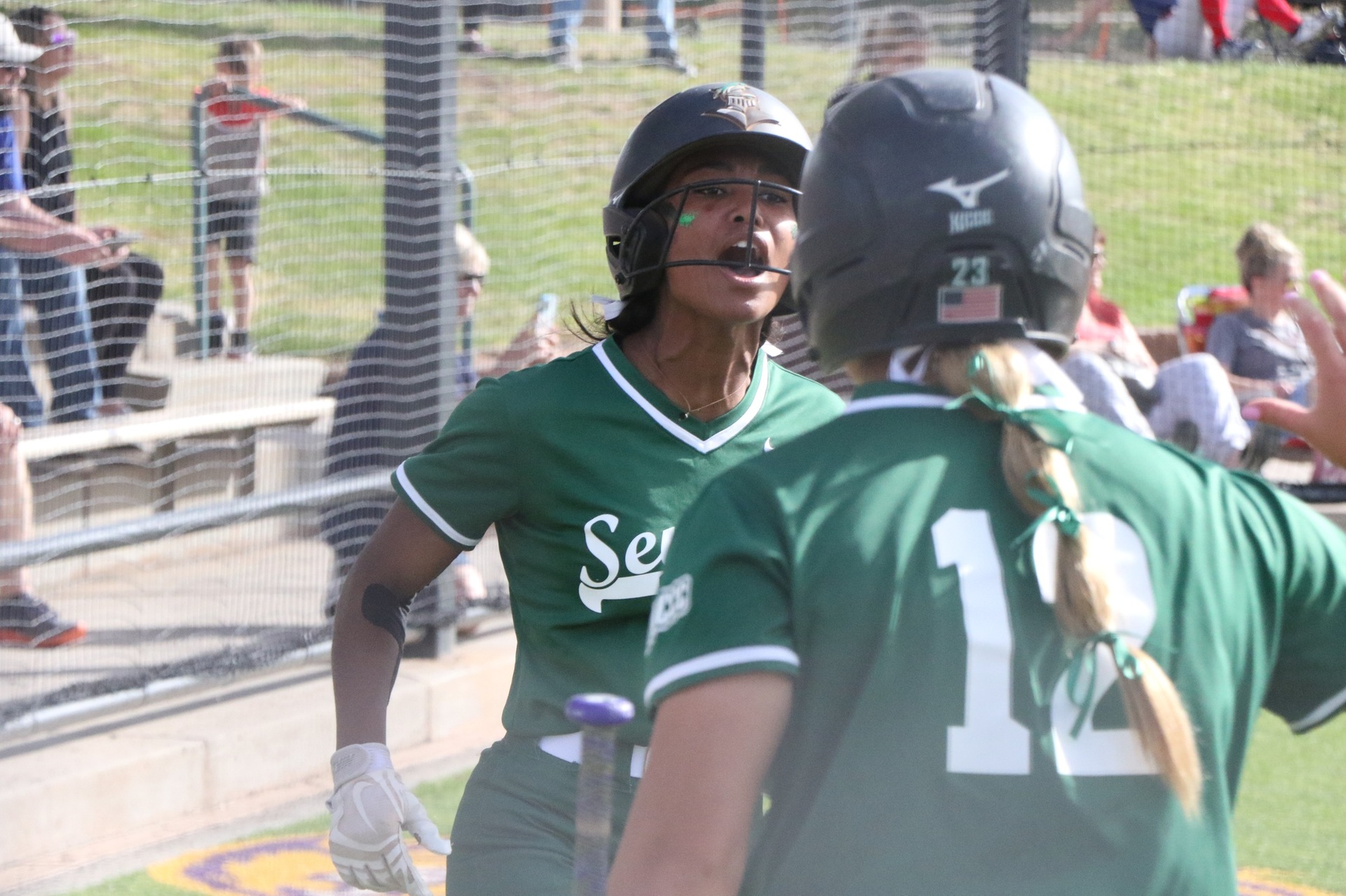 Saints Softball Opens Region 6 With a Win
