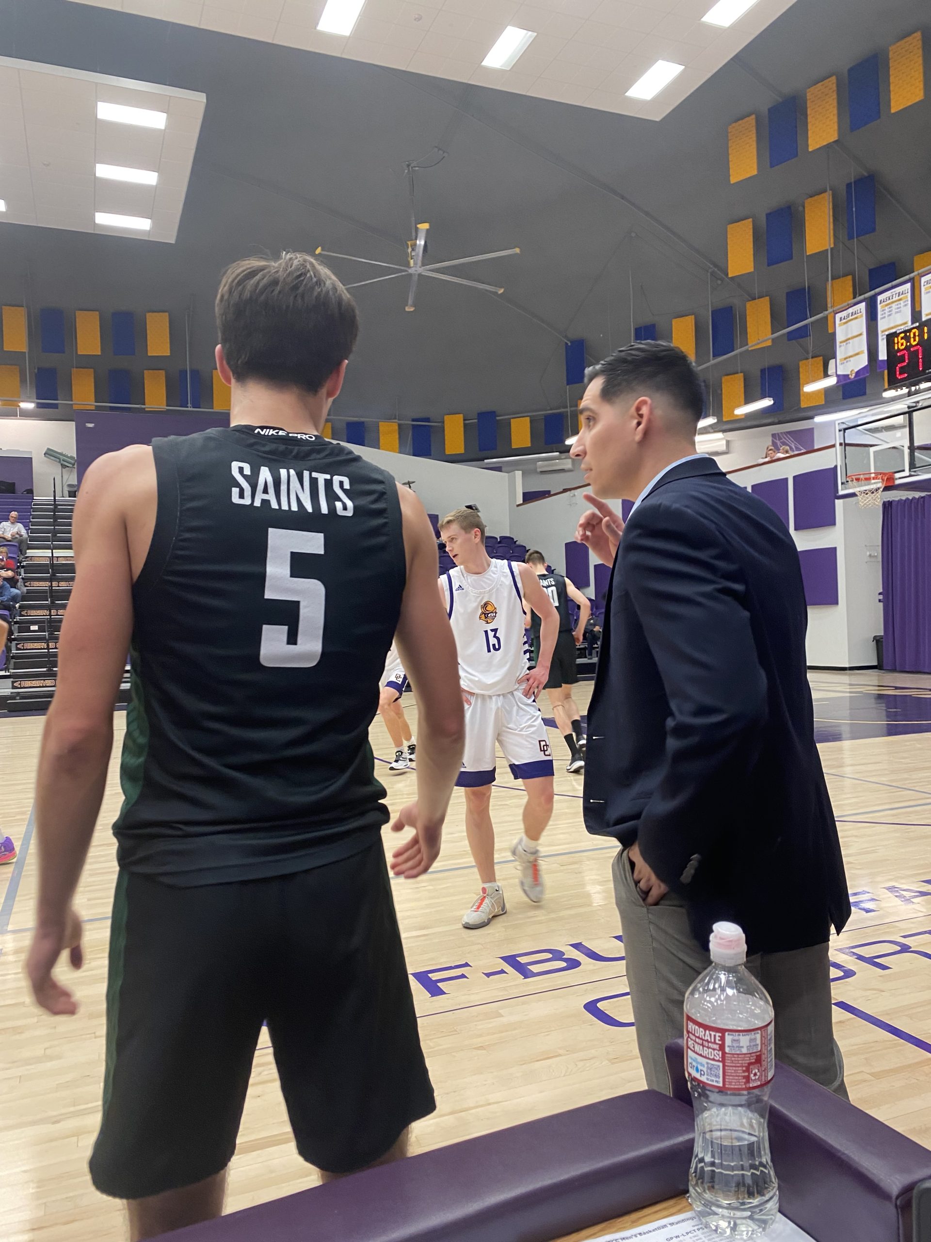 Saints Hold On for Upset Win Over Rival Conqs