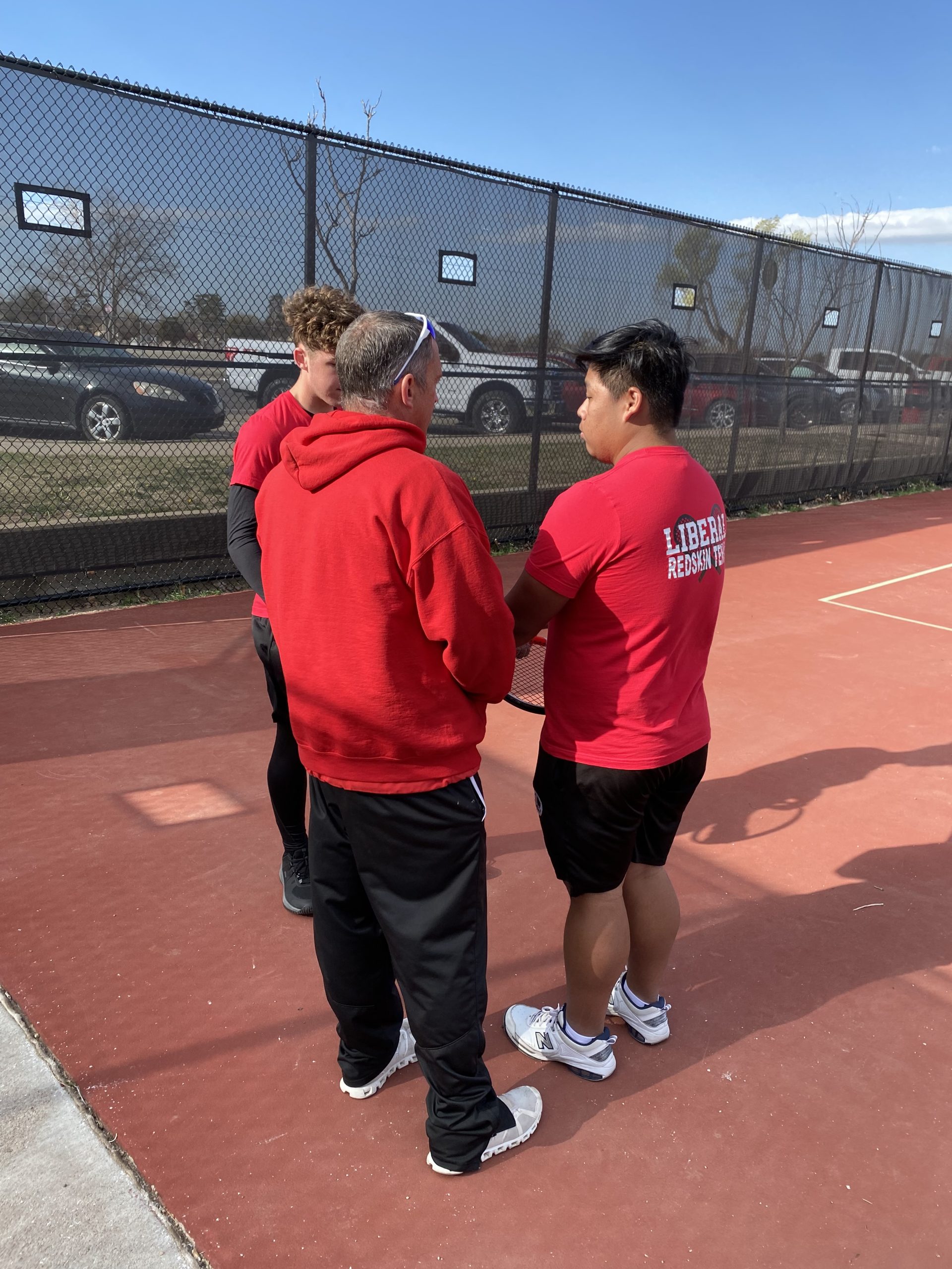 LHS Tennis Plays in Wind in Great Bend